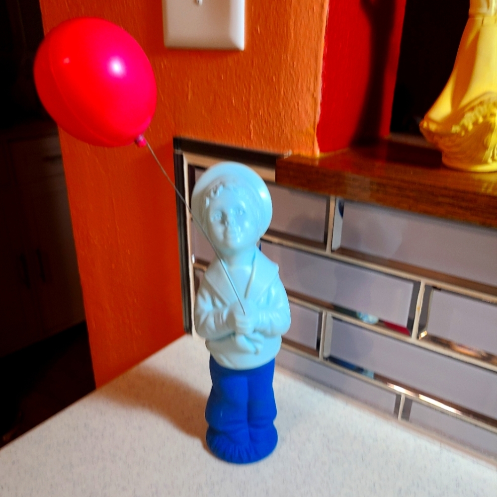 Blue Figurine with Balloon avon collectible bottle for sale empty